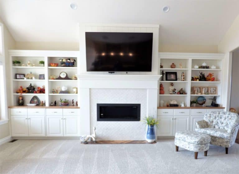 white shelves with tv in the middle