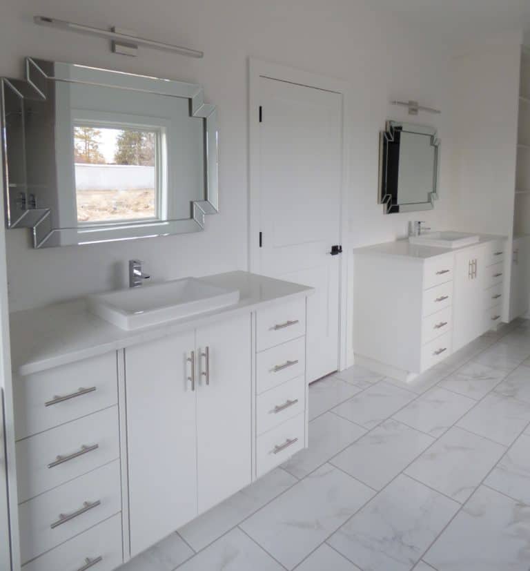 white wooden cabinets inside bathroom