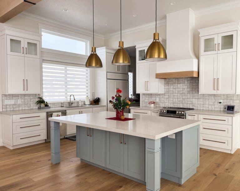 kitchen view with custom cabinets, island and range hood